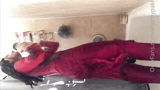 Pakistani girl in shalwar kameez bathing