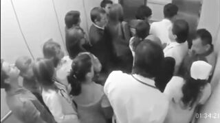 Doctor Groping Nurse In Elevator Full Of People