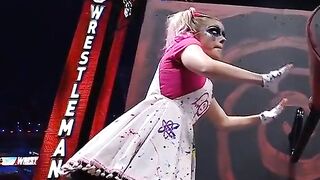 WWE - Alexa Bliss turning a crank at Wrestlemania 37