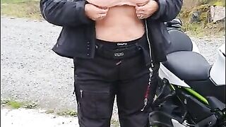 Milf flashing tits outdoors and giving hubby a handjob