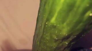 Swiss girl fucks herself with a cucumber