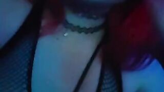 girl dances to loud club music wearing only a mesh top