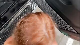 A hot redhead sucks my dick at a public car wash on a rainy day with people around