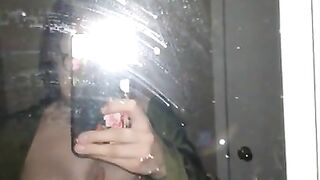 Whore playing with big tits in dirty mirror