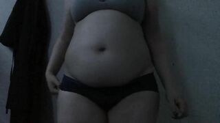 Feedee plays with empty and full bellyplay