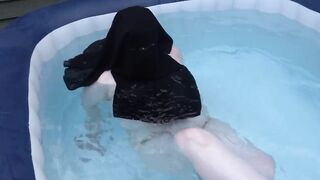 naked in Niqab in the hot tub