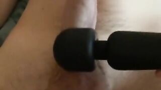 Milking his cock with vibrator