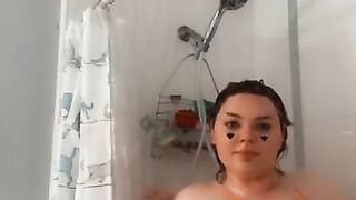 Rubbing huge tits in the shower