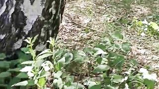 Masturbating on the tree using dry twig. Hairy cunt in the forest