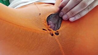 Indian girl working from home with hole in her pants. Under table view.