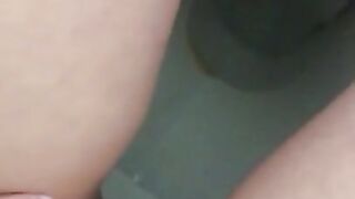 Sexy teen pisses on the toilet