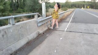 BBW walking outdoors in highway