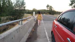 BBW walking outdoors in highway