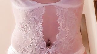 Girl in white lingerie teasing with her boobs and pussy