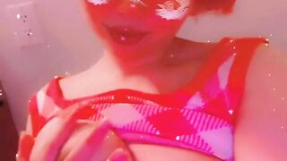 Pink anime dream girl plays with her big boobs