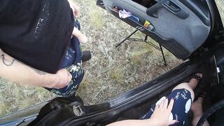 the bitch sits in the car and jerks off my dick in nature until I cum