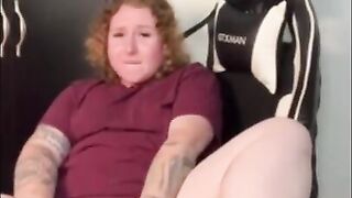 Amateur redhead masturbates in husbands gaming chair while he's at work