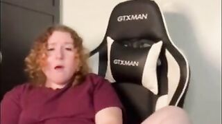 Amateur redhead masturbates in husbands gaming chair while he's at work