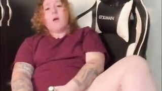 Amateur redhead masturbates in husbands gaming chair while he's at work