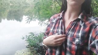 Girl masturbates by the lake