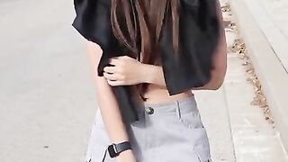 Little dark hood caught flashing tits by a car passing by